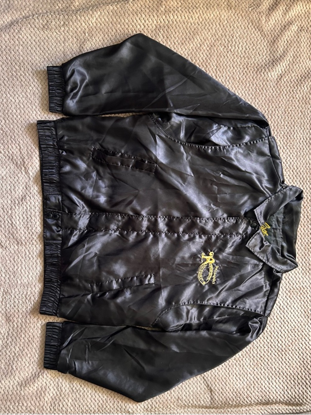 Black Satin Bomber Jacket with Embroidered Gold Crest